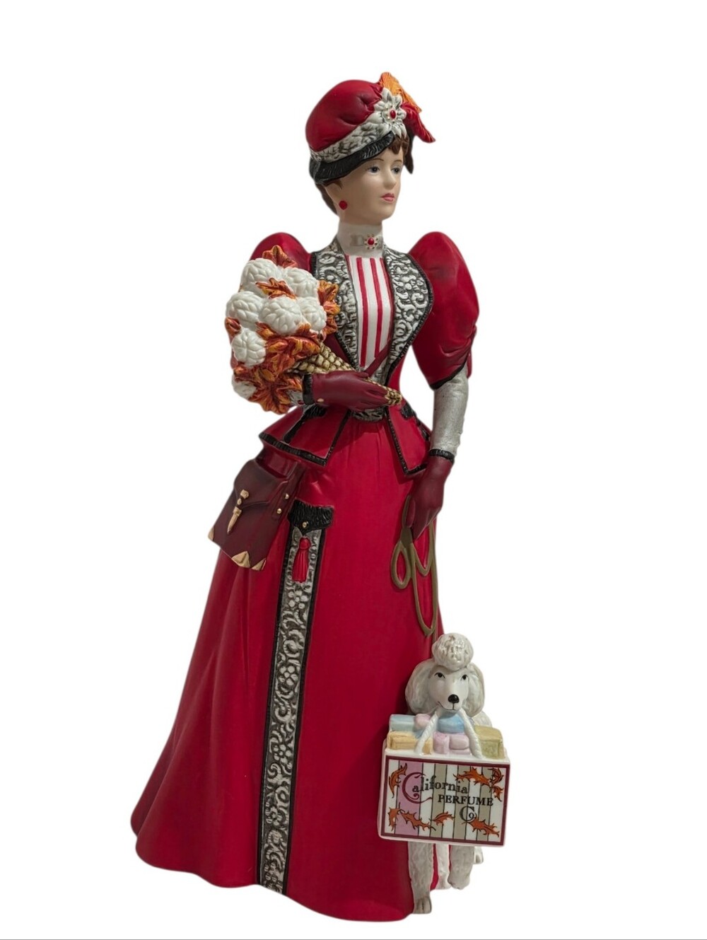 Vintage 1997 Avon Mrs. Albee President's Club Award porcelain figurine.